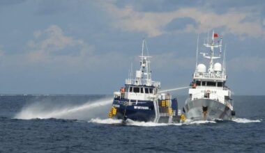 Chinese coast guard rams and damages a Philippine vessel off an island in the South China Sea