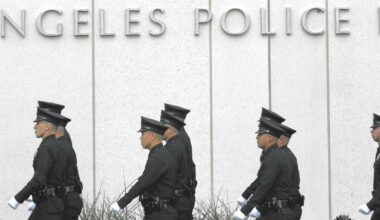 Woman charged with murder in connection with a body found in a burned Honda in South L.A.