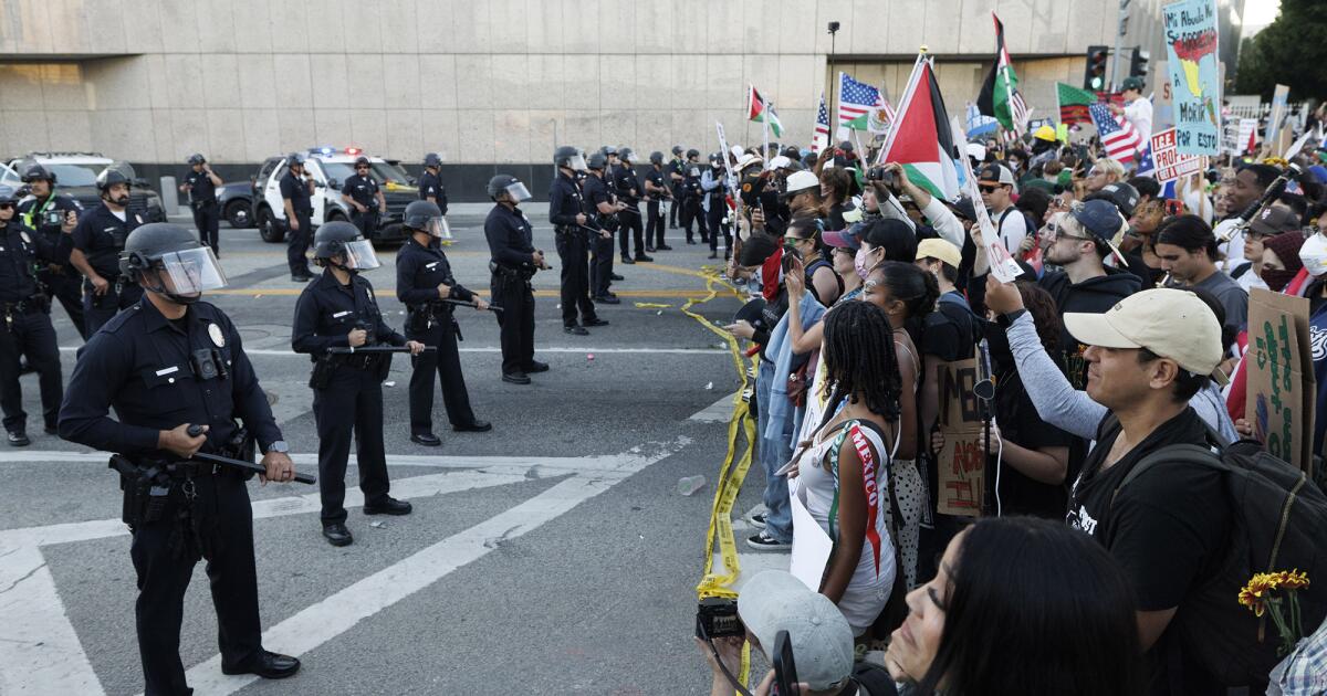 Police declare 'unlawful assembly' at downtown L.A. protest