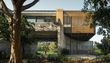 IDIN architects elevates home in thailand to shelter a garden for client's cows