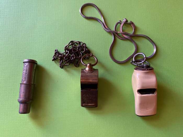 three vintage NYPD whistles 