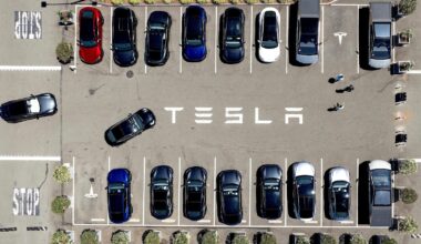 Parents of woman killed in Tesla crash allege design flaw trapped her in burning car