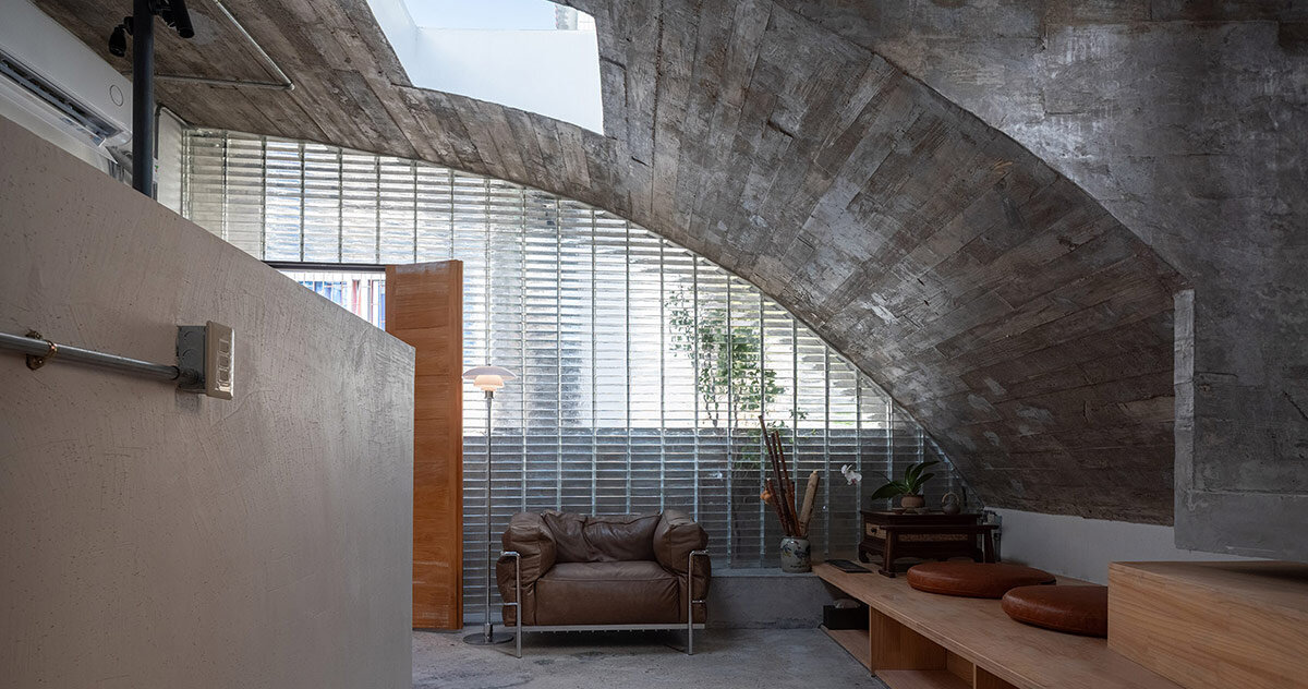 concrete arches enclose glass block interiors of renovated xuebei home