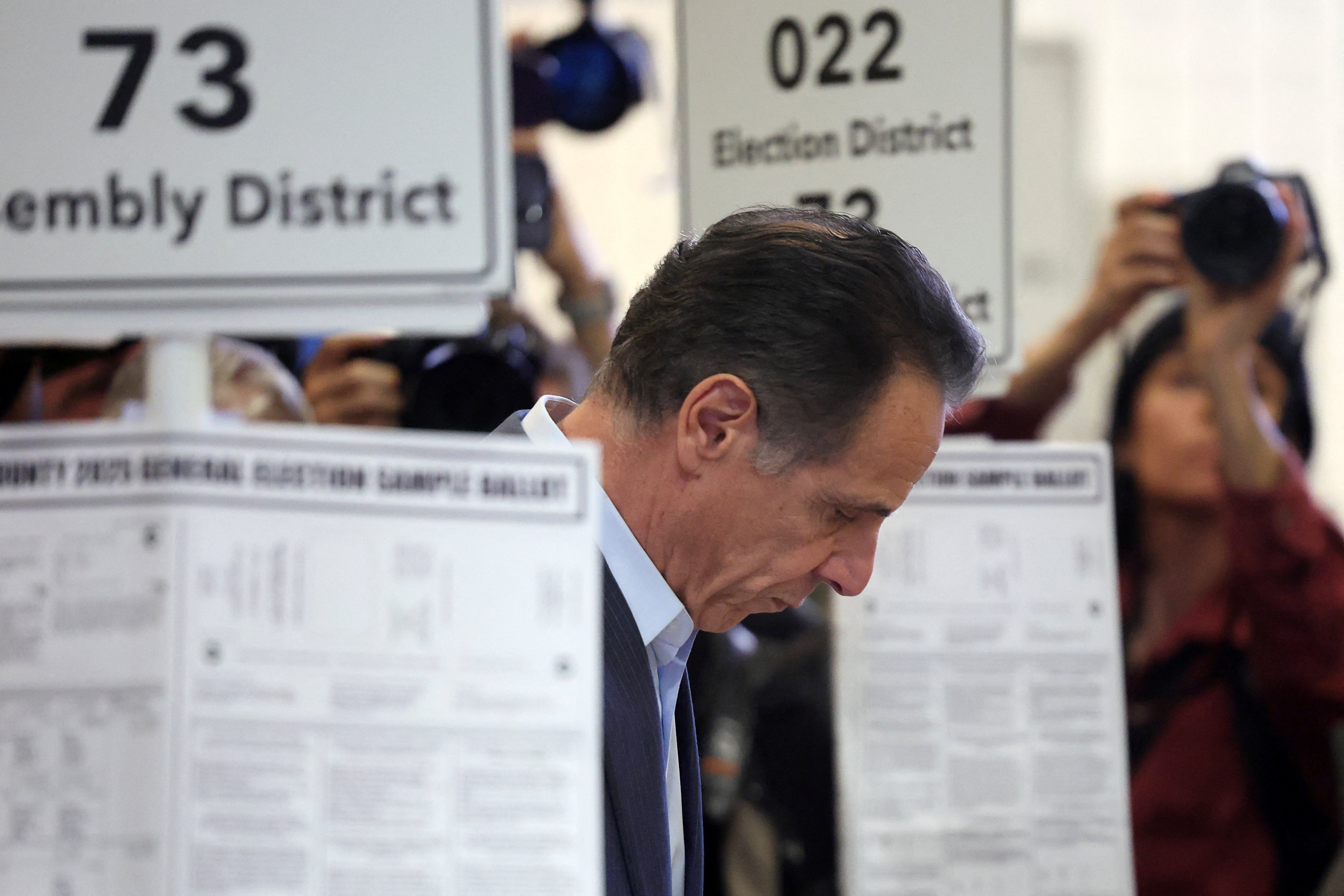 Andrew Cuomo visits a polling station at the High School of Art and Design in Manhattan