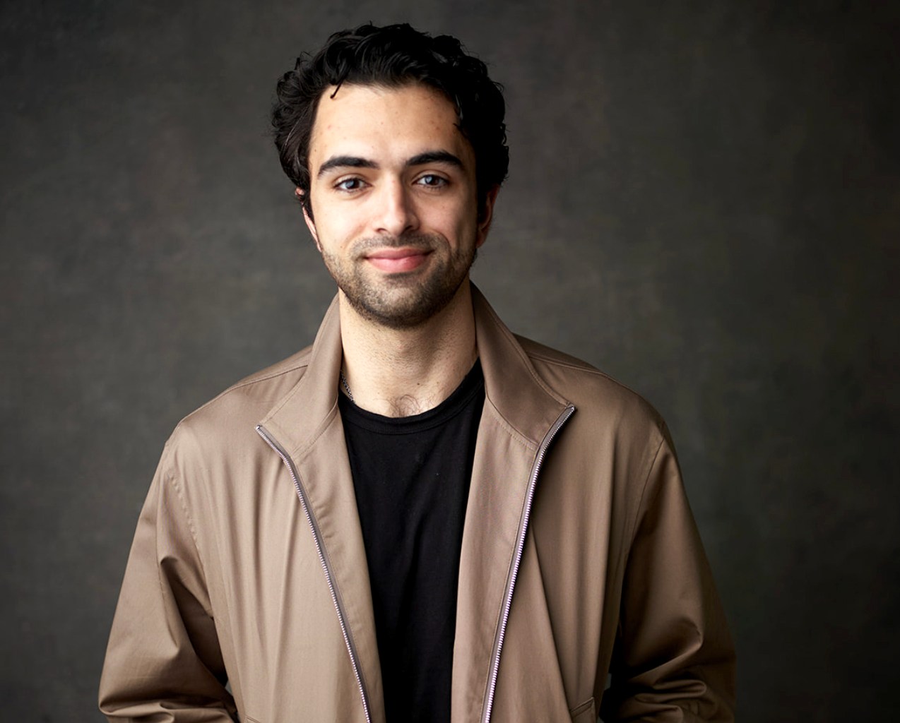 Dara Ladjevardian, Co-founder and CEO of Delphi, smiling.