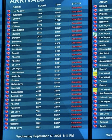 An electronic board shows a list of arriving flights all marked "canceled."