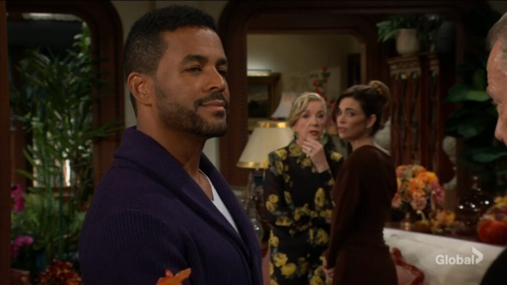 Nate shakes hands with Victor.