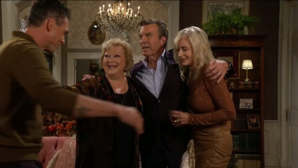 Billy, Traci, Jack, and Ashley hug.