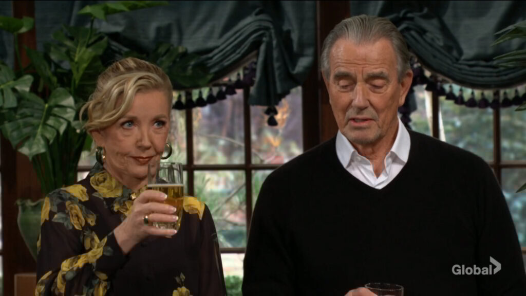 Nikki and Victor toast.