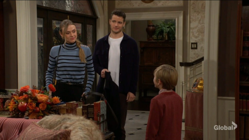 Claire talks to Harrison as Kyle holds her coat.