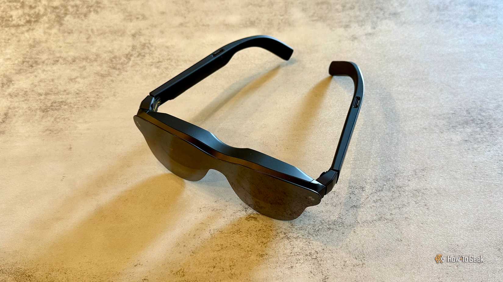 RayNeo Air 3s Pro on a table top.