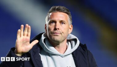 A close-up of former Middlesbrough boss Rob Edwards waving