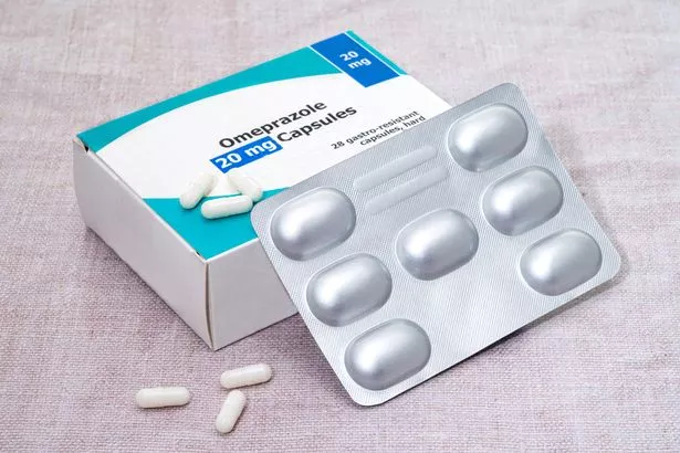 A box and blister pack of omeprazole