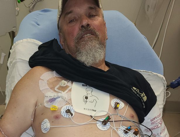 Jim in hospital after being diagnosed with cancer (Jam Press)