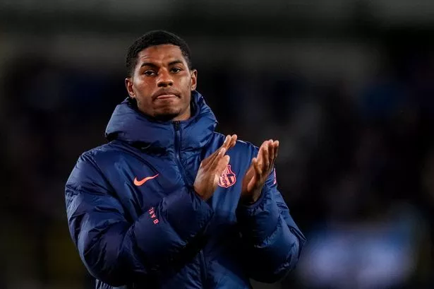Marcus Rashford  applauds the crowd. 