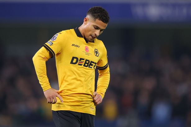 Joao Gomes of Wolverhampton Wanderers looks dejected 