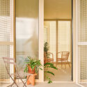 67-Unit Social Housing Building in Illa Glòries / Vivas Arquitectos + Pau Vidal - Interior Photography, Wood, Glass, Chair