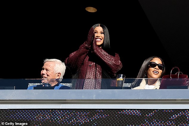 On Sunday, Cardi B joined Robert Kraft (left) to cheer on the New England Patriots