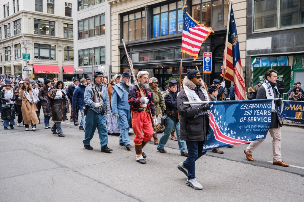 People participate in the 106th annual Veterans Day Parade on November 11, 2025, in New York City. 