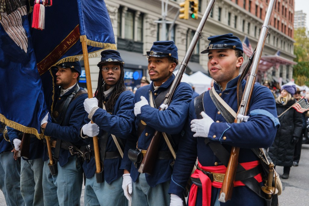 People participate in the 106th annual Veterans Day Parade on November 11, 2025, in New York City. 
