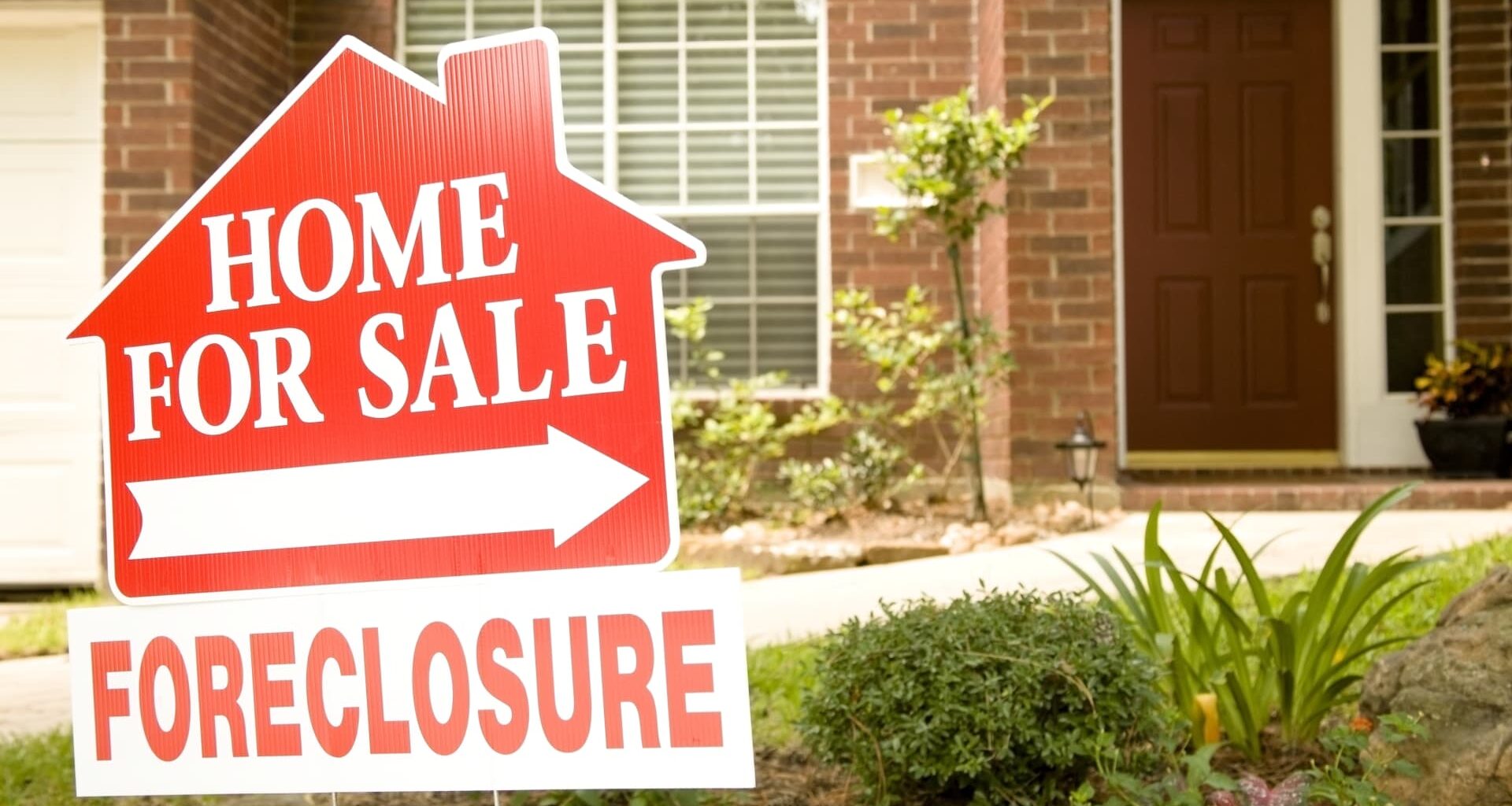 Foreclosures rise in October, a sign of housing market distress