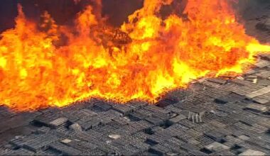 Large pallet fire burns in South Dallas