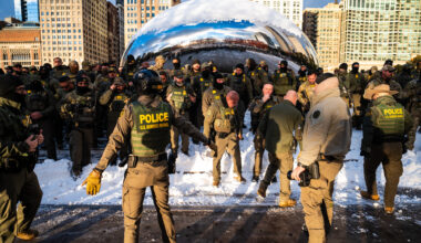 Border Patrol Agents Pose At 'The Bean' For Apparent Photo Op