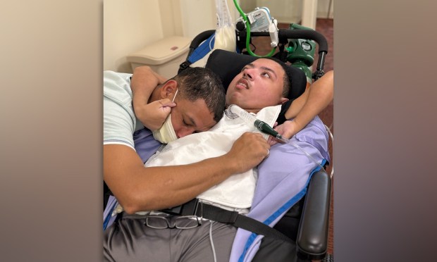 Heury Gomez, 43, reunites with his disabled 18-year-old son Noah after spending over three months in ICE detention.