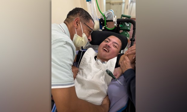 Heury Gomez, 43, reunites with his disabled 18-year-old son Noah after spending over three months in ICE detention.