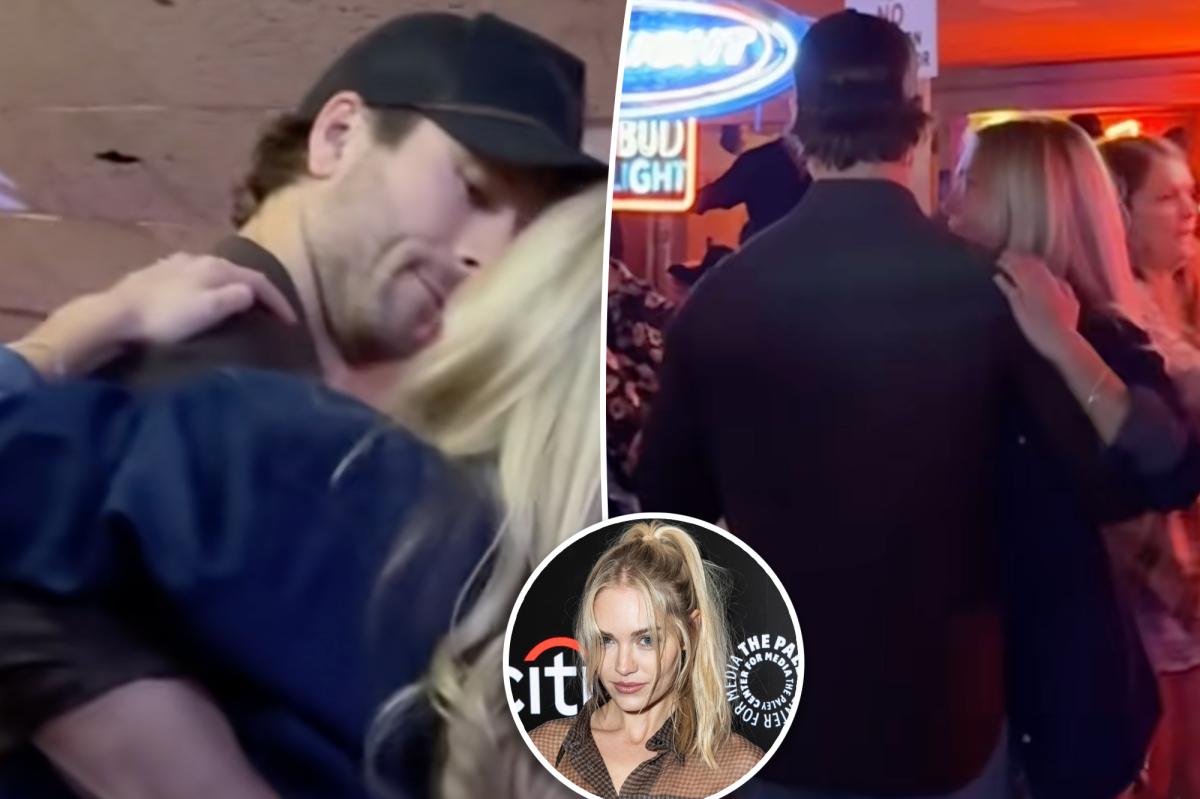 Glen Powell cozies up to actress Michelle Randolph on line dancing date night