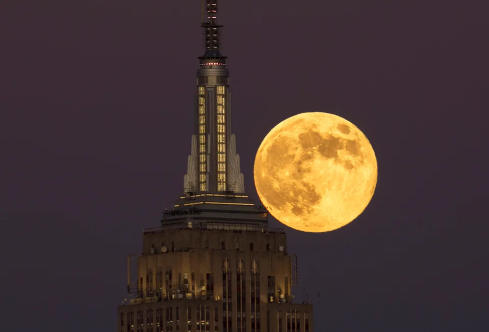 The Beaver moon rises behind the Empire State Building in New York City on Nov. 15, 2024