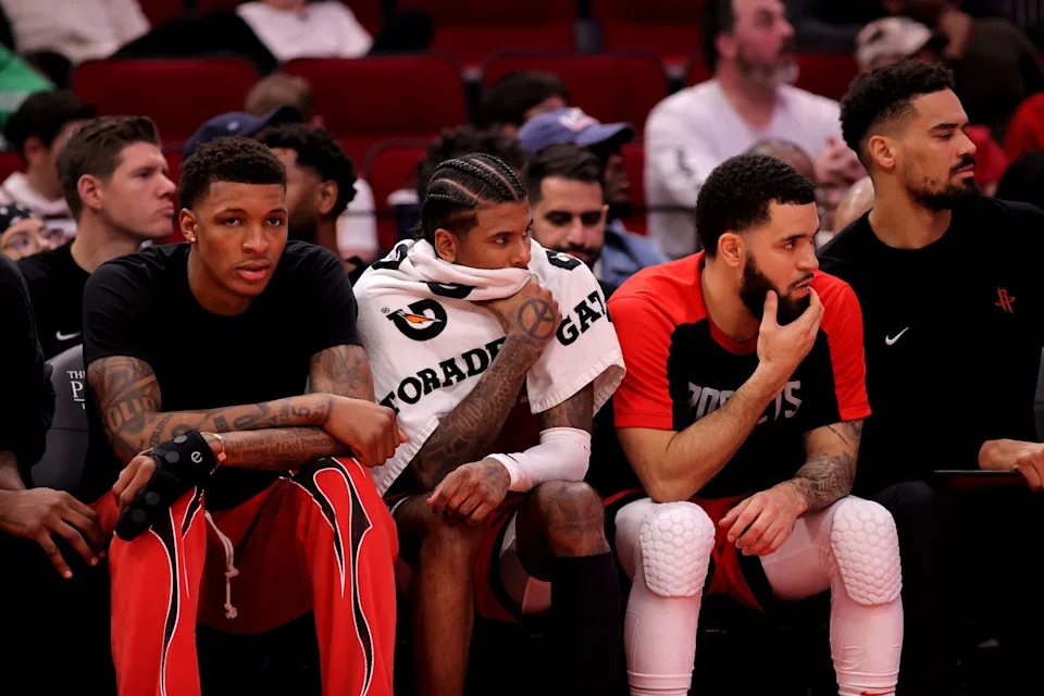 Jan 3, 2025; Houston, Texas, USA; (from L-to-R) Houston Rockets forward Jabari Smith Jr (10), guard Jalen Green (4) and guard Fred VanVleet (5) sit on the bench against the Boston Celtics during the game at Toyota Center. Mandatory Credit: Erik Williams-Imagn Images