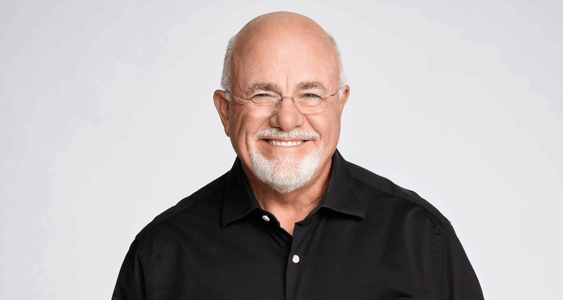 Dave Ramsey smiling confidently on a white background