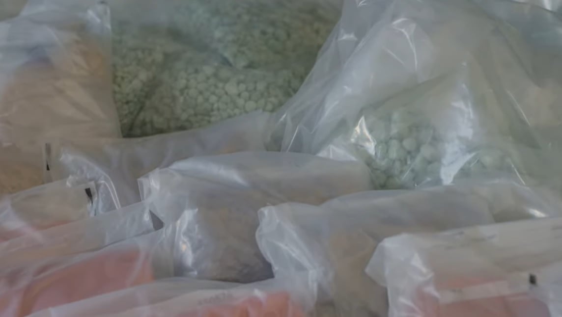 Packages of drugs seized by officers in Windsor in what the OPP calls its largest ever fentanyl bust.