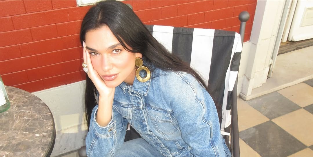 Dua Lipa Pairs All-Denim Look With Striking Leopard-Print Pumps