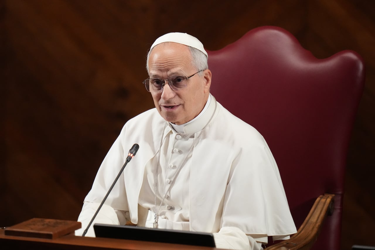 Pope sitting in chair