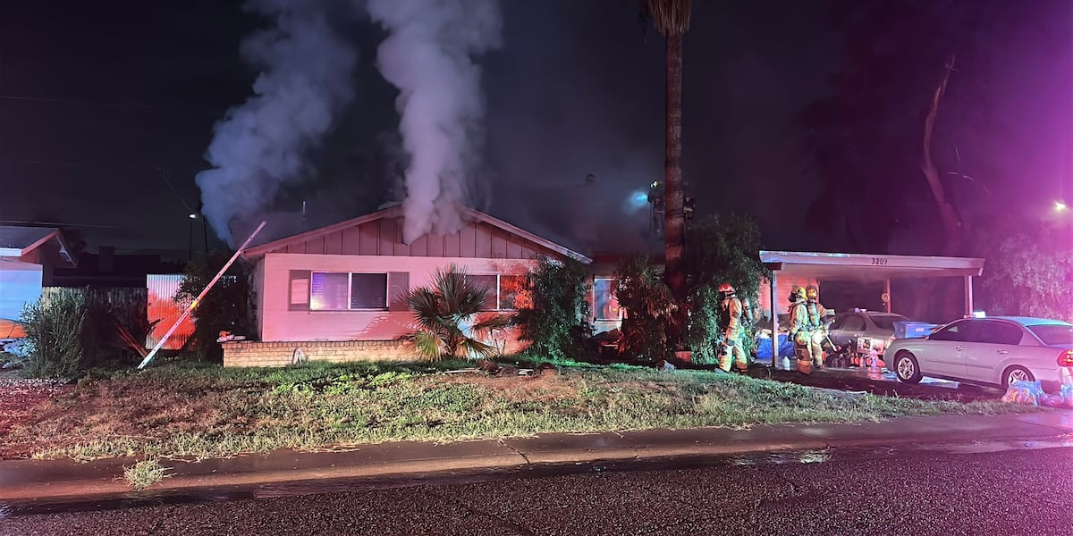 Crews battle house fire in north Phoenix