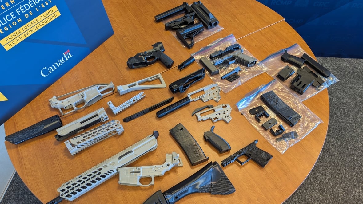 A photo of a variety of 3D printed guns.