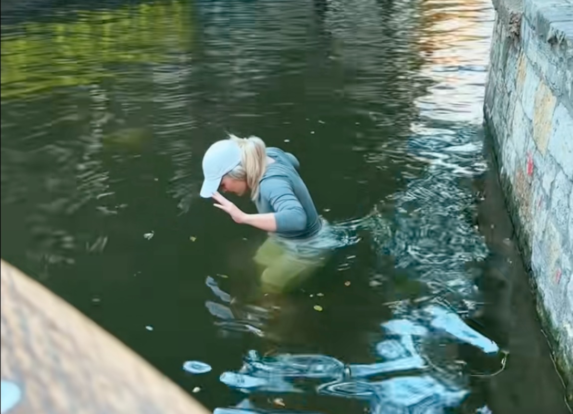 Clip of woman wading in San Antonio River in search of lost phone goes viral