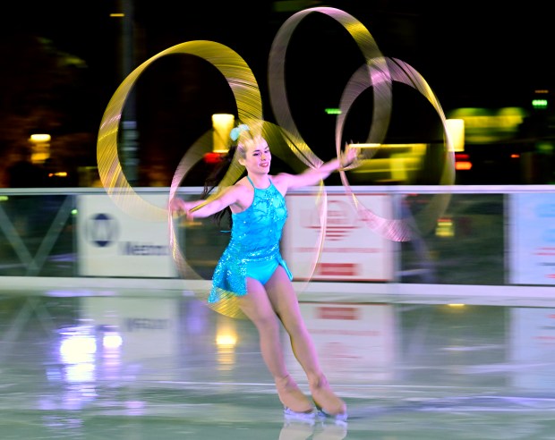 Rachel Clement performs with hula hoops in this motion blur...