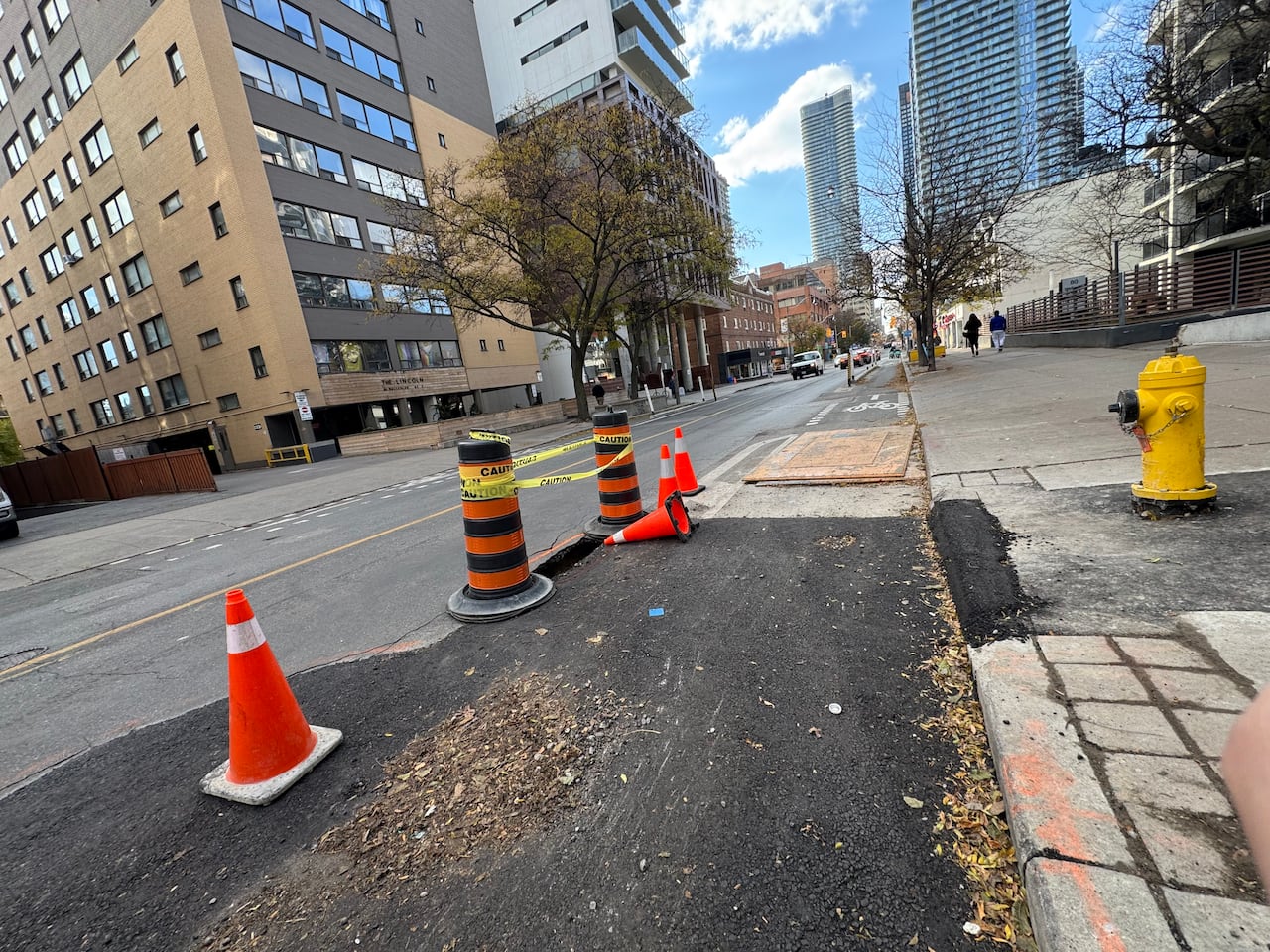 The sinkhole on Wellesley just east of Church is the second in the same area in less than two weeks. Police estimated it to be about 2.5 metres long. 