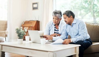 Shot of a senior couple using a laptop together at home.