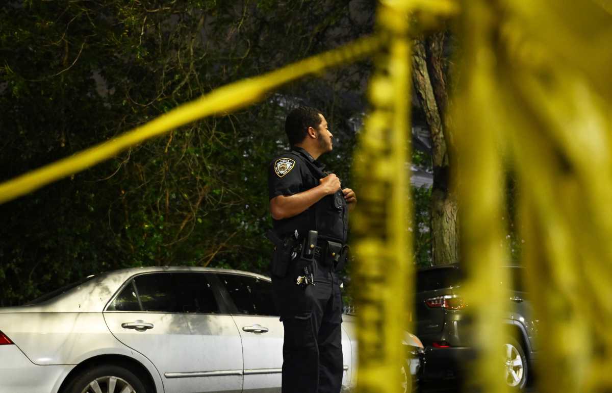 police officer at scene of shooting in Manhattan