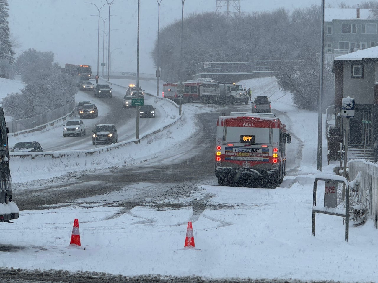 city buses stuck on snowy road