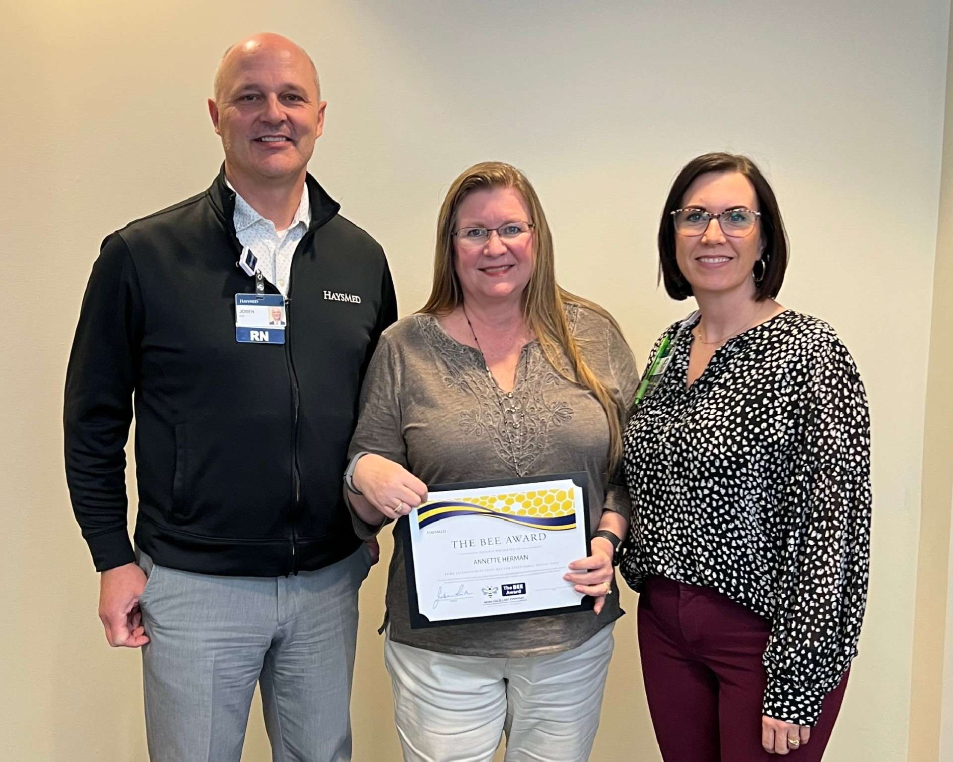 Joben Rieth, vice president of patient care services and chief nursing officer, Annette Herman, clinic office assistant, and Shawna North, physician practice administration business operations manager. Photo by Hays Med