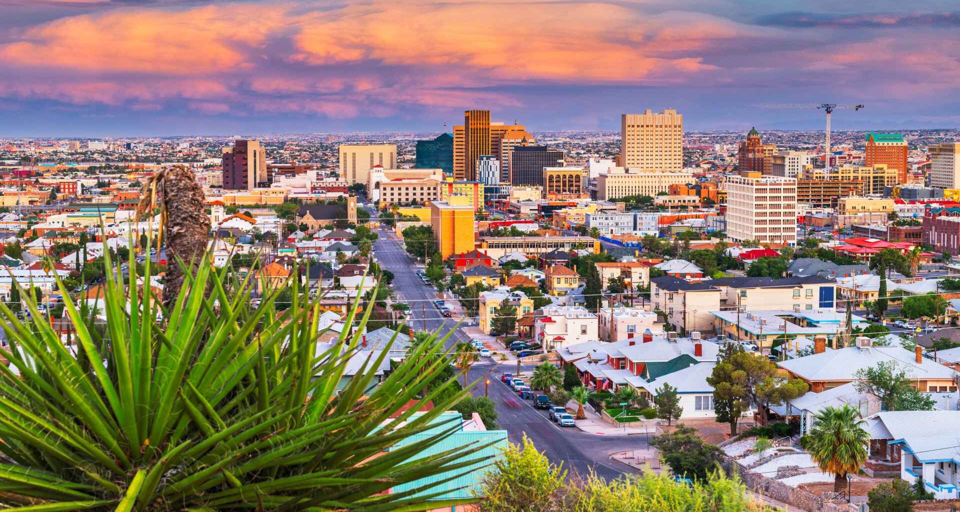 El Paso, Texas, USA  downtown city skyline at dusk with Juarez, Mexico in the distance.