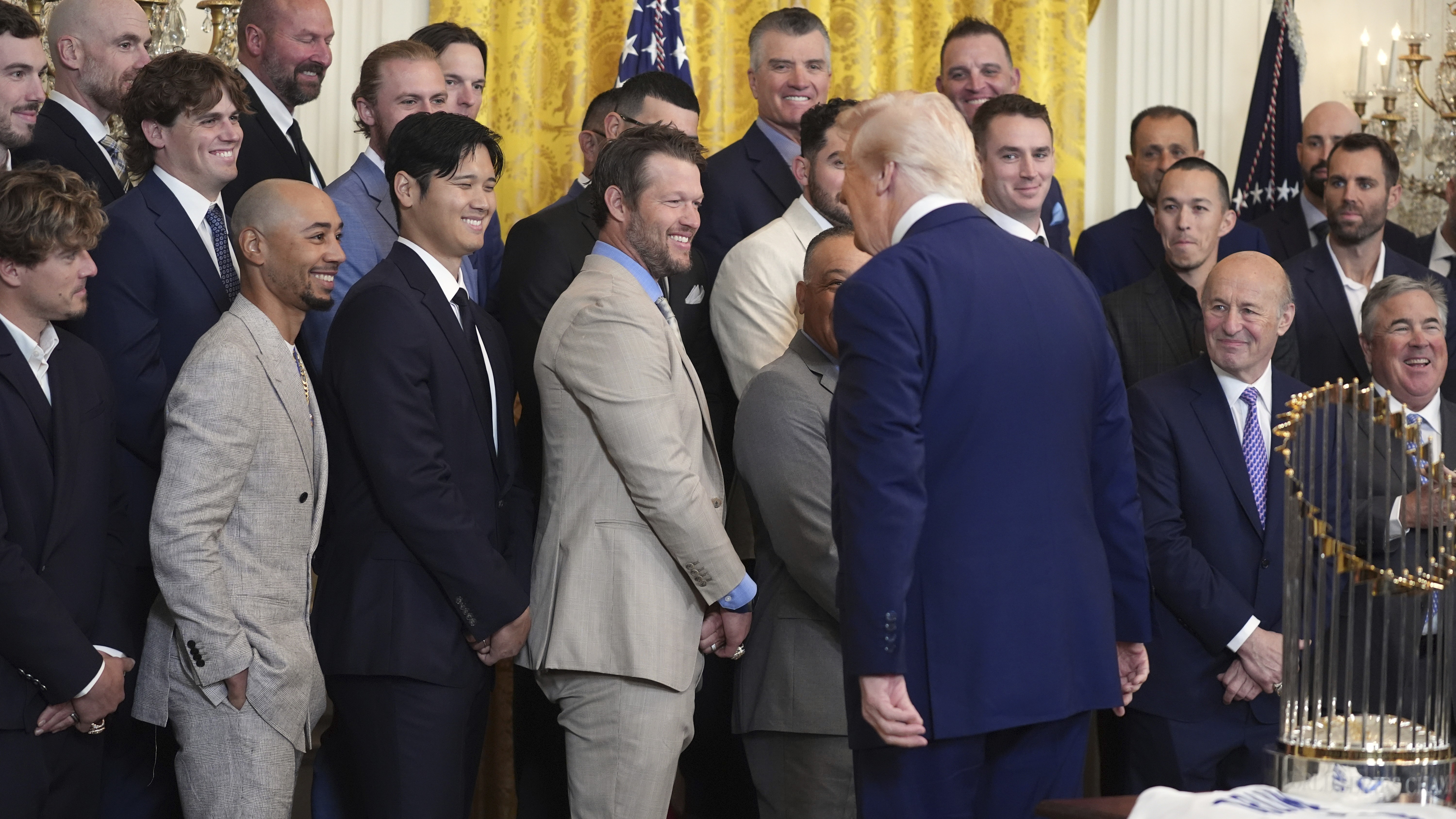 President Donald Trump greets Los Angeles Dodgers during a ceremony to honor the 2024 World Series Champions in the East Room of the White House, Monday, April 7, 2025.