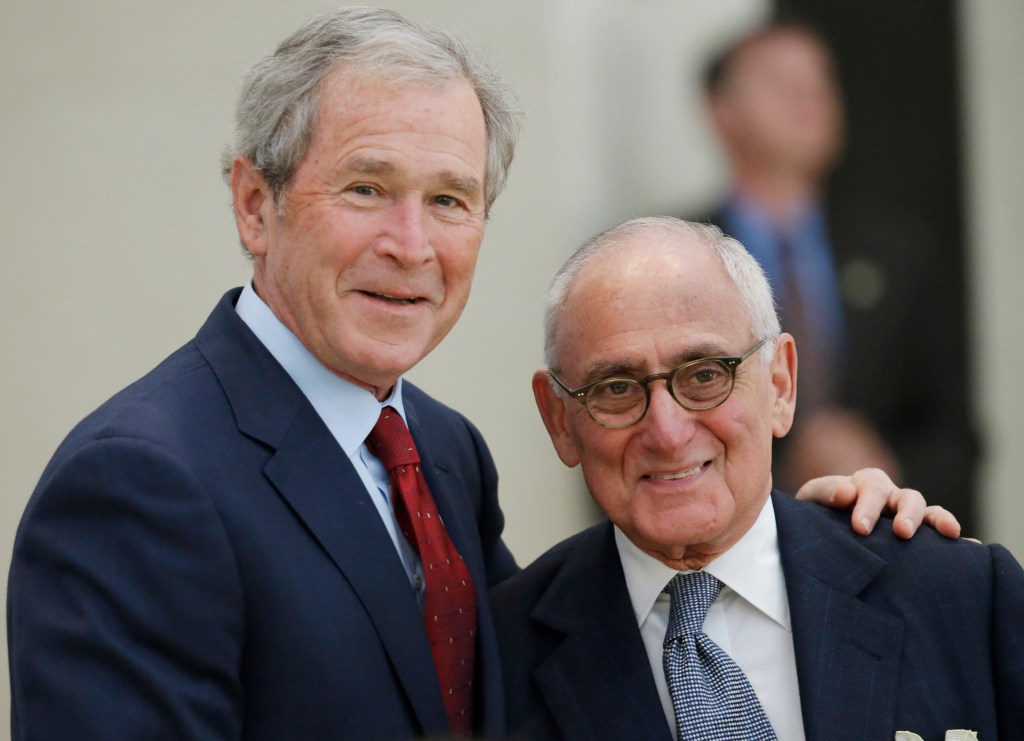 Former President George W. Bush and architect Robert A.M. Stern pose for a photo.