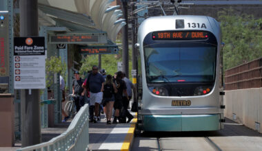 A light rail train stops for passengers, Monday, Aug. 26, 2019 in Tempe.