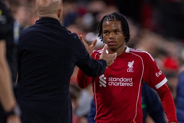 LIVERPOOL, ENGLAND - Tuesday, September 23, 2025: Liverpool's Rio Ngumoha shakes hands with head coach Arne Slot as he is substituted during the Football League Cup 3rd Round match between Liverpool FC and Southampton FC at Anfield. Liverpool won 2-1. (Photo by David Rawcliffe/Propaganda)